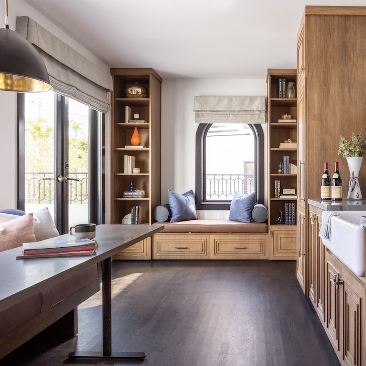 Orli La Jolla room with a view of the kitchenette, desk and window seat