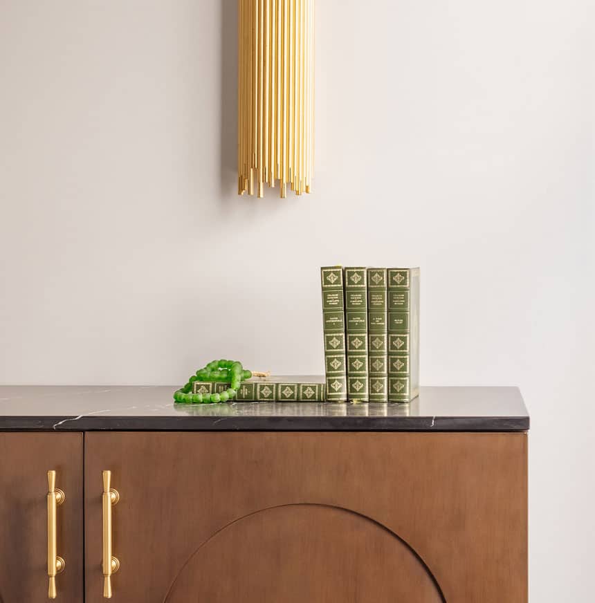 Stack of books inside of The Nook hotel room at Orli La Jolla boutique hotel