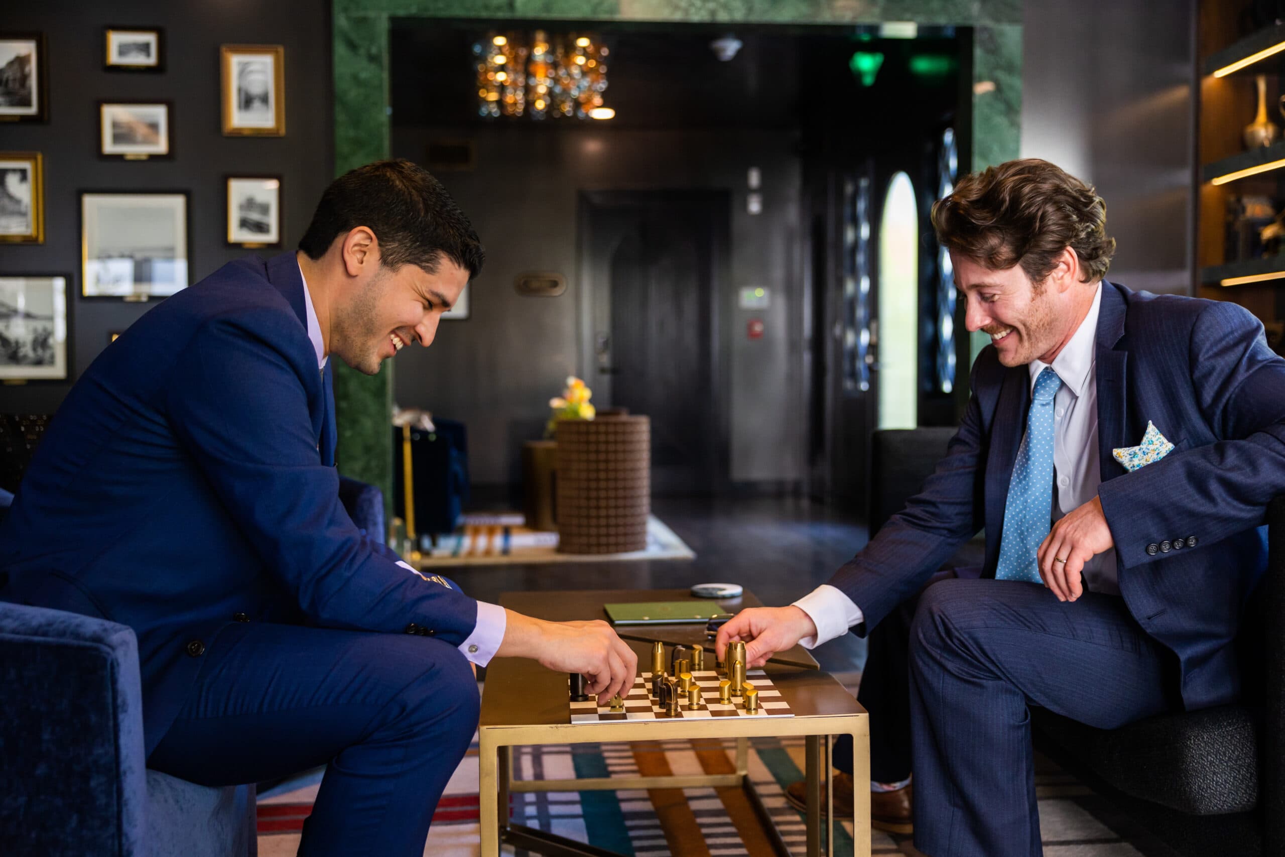 Two wedding guests playing chess in the Orli