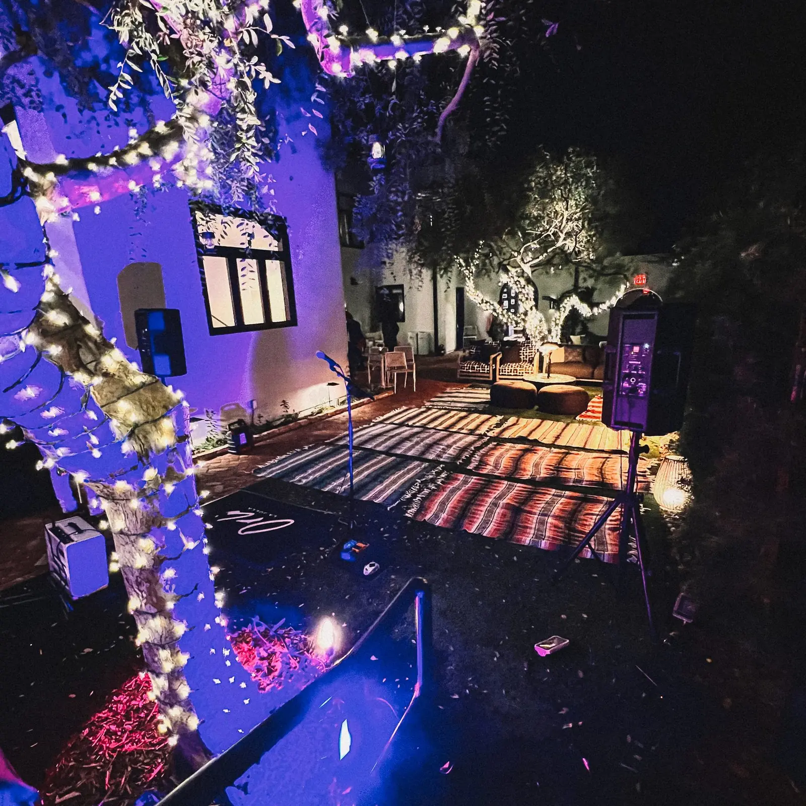 Holiday lights in the Orli La Jolla courtyard at night